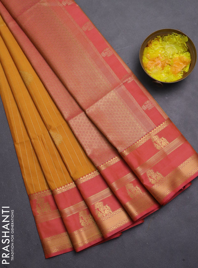 Semi soft silk saree mustard yellow and peach pink with allover zari weaves & buttas and zari woven border