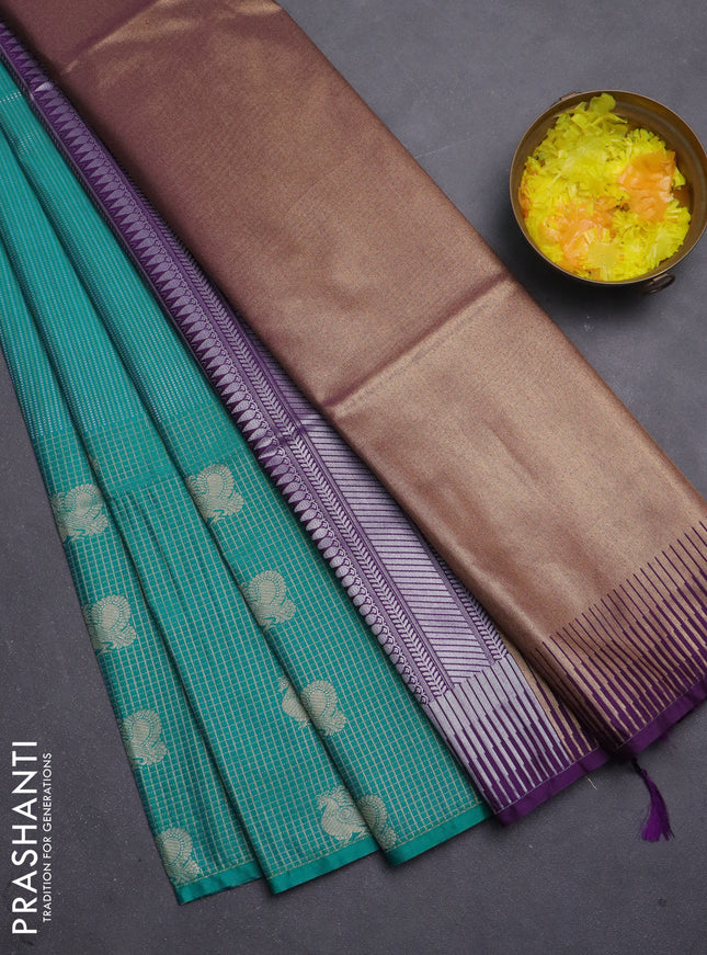 Semi soft silk saree teal blue and purple with allover zari weaves & buttas and long zari woven butta border