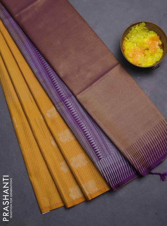 Semi soft silk saree mustard yellow and purple with allover zari weaves & buttas and long zari woven butta border