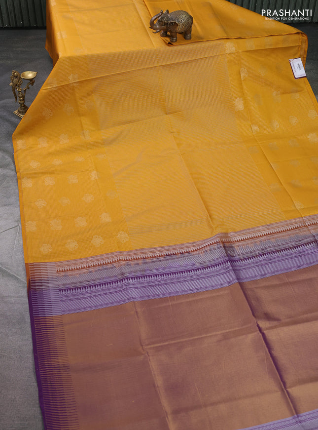 Semi soft silk saree mustard yellow and purple with allover zari weaves & buttas and long zari woven butta border