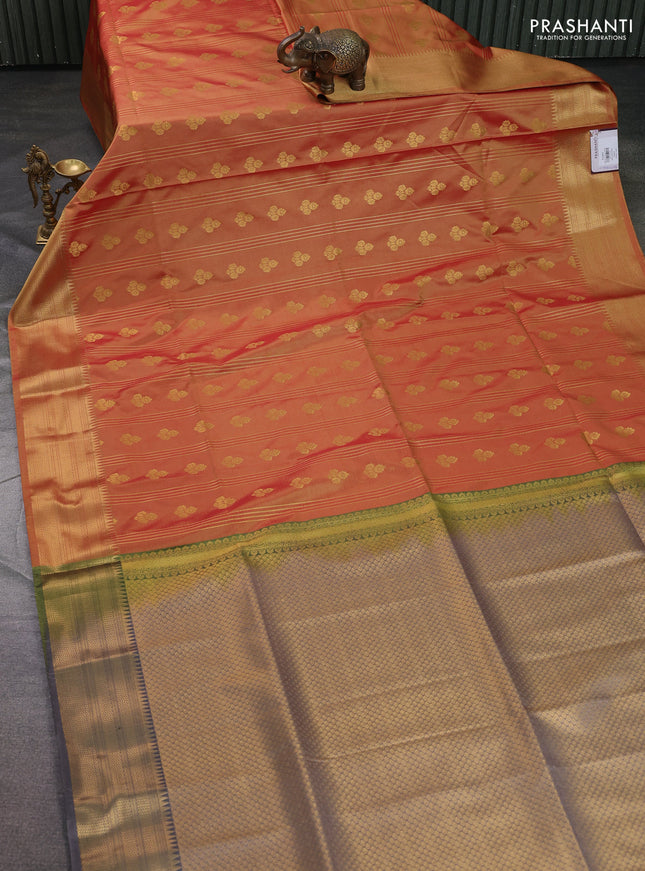 Semi soft silk saree dual shade of orange and grey with allover zari weaves & buttas and zari woven korvai border