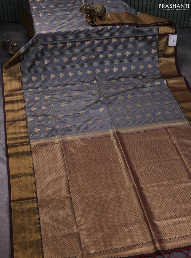 Semi soft silk saree grey and deep maroon with allover zari weaves & buttas and zari woven korvai border