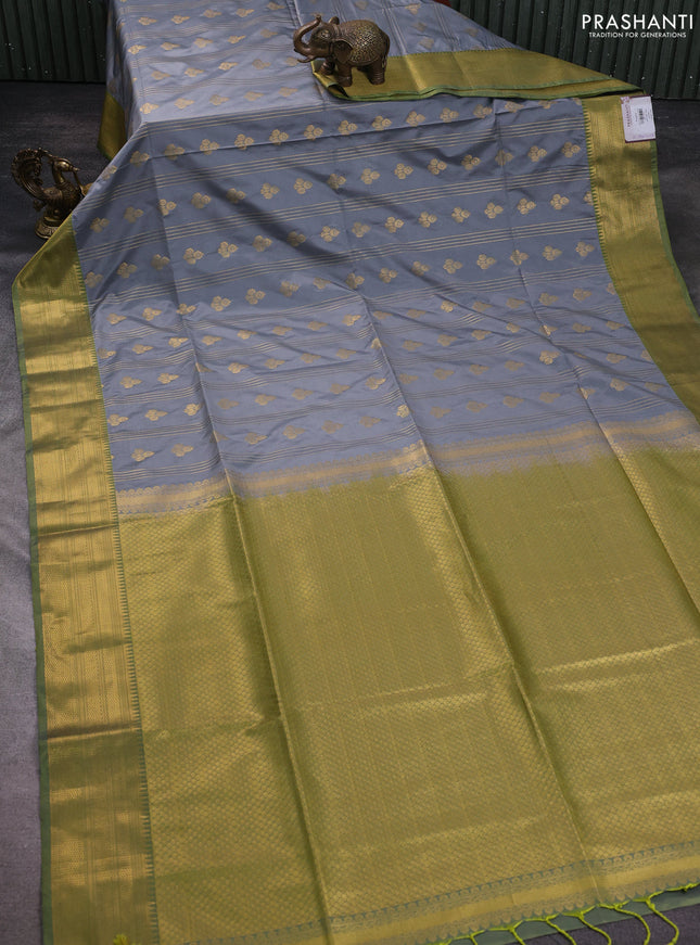 Semi soft silk saree grey and lime green with allover zari weaves & buttas and zari woven korvai border