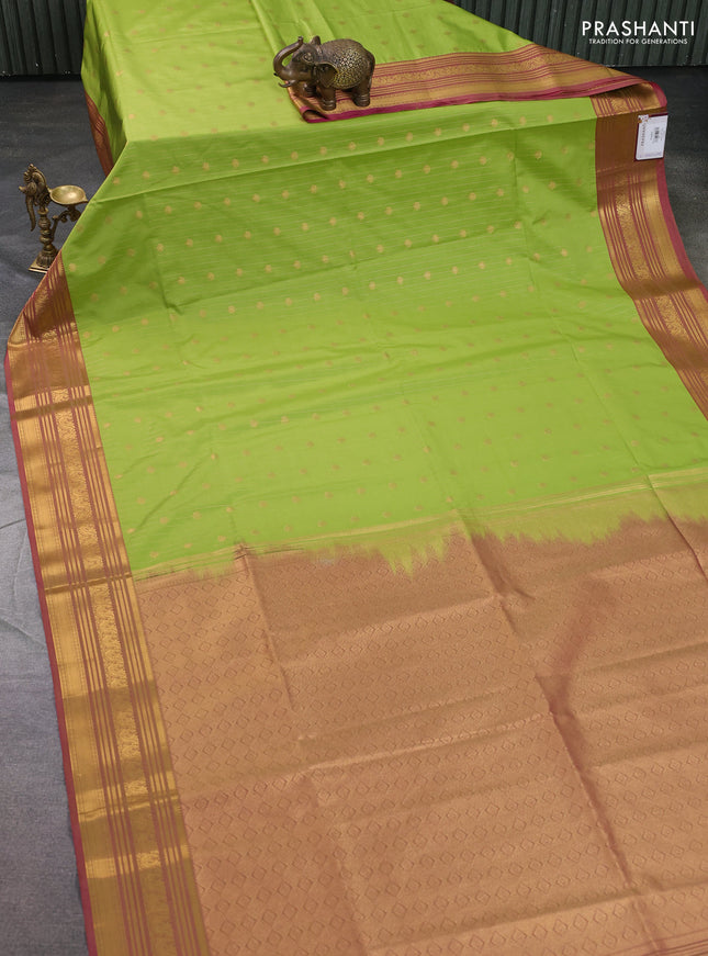 Semi soft silk saree llime green and pink with allover zari weaves & buttas and zari woven korvai border