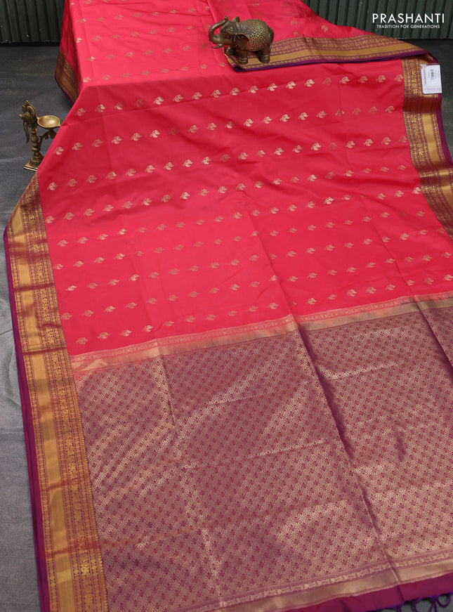 Semi soft silk saree pink shade and dual shade of purple with allover zari woven buttas and zari woven korvai border