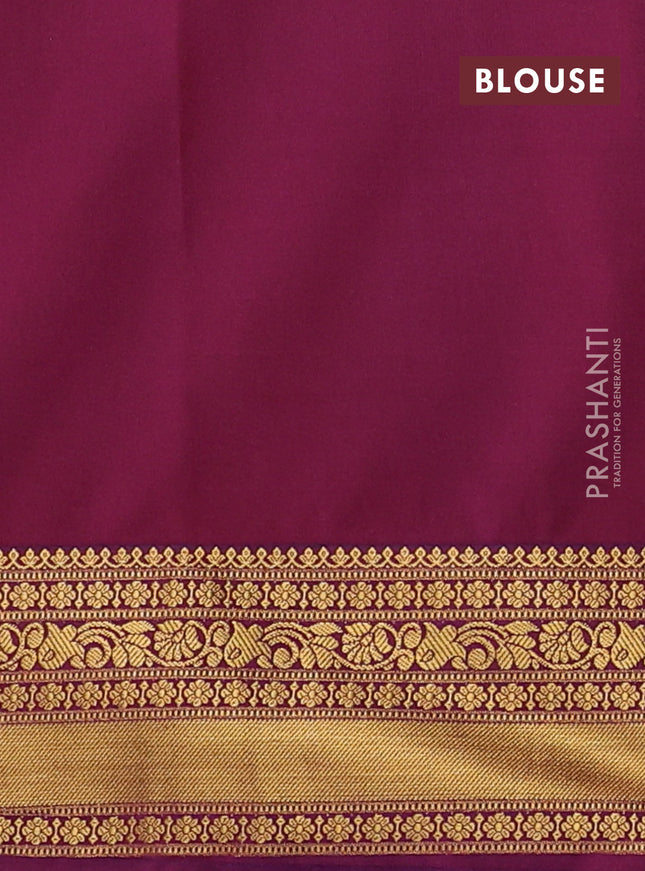 Semi soft silk saree pink shade and dual shade of purple with allover zari woven buttas and zari woven korvai border