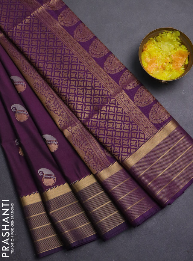 Semi soft silk saree wine shade and violet with allover paisley zari woven buttas and zari woven border
