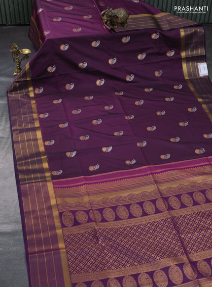Semi soft silk saree wine shade and violet with allover paisley zari woven buttas and zari woven border
