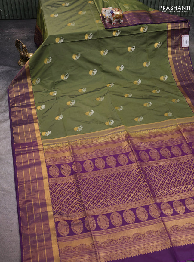 Semi soft silk saree sap green and violet with allover paisley zari woven buttas and zari woven border