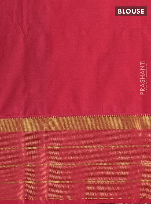 Semi soft silk saree black and peach pink with allover paisley zari woven buttas and zari woven border