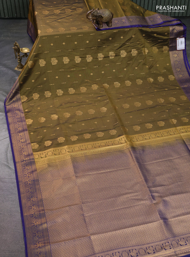 Semi soft silk saree mehendi green and navy blue with allover zari woven buttas and zari woven korvai border