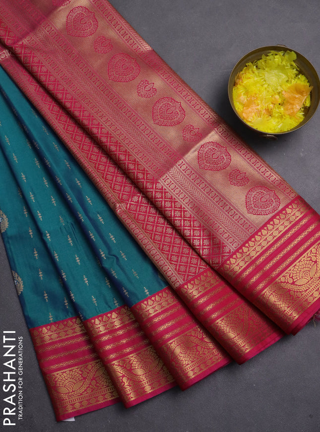 Semi soft silk saree peacock blue and pink with allover zari woven buttas and zari woven border