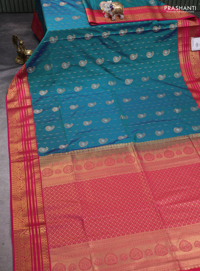 Semi soft silk saree peacock blue and pink with allover zari woven buttas and zari woven border