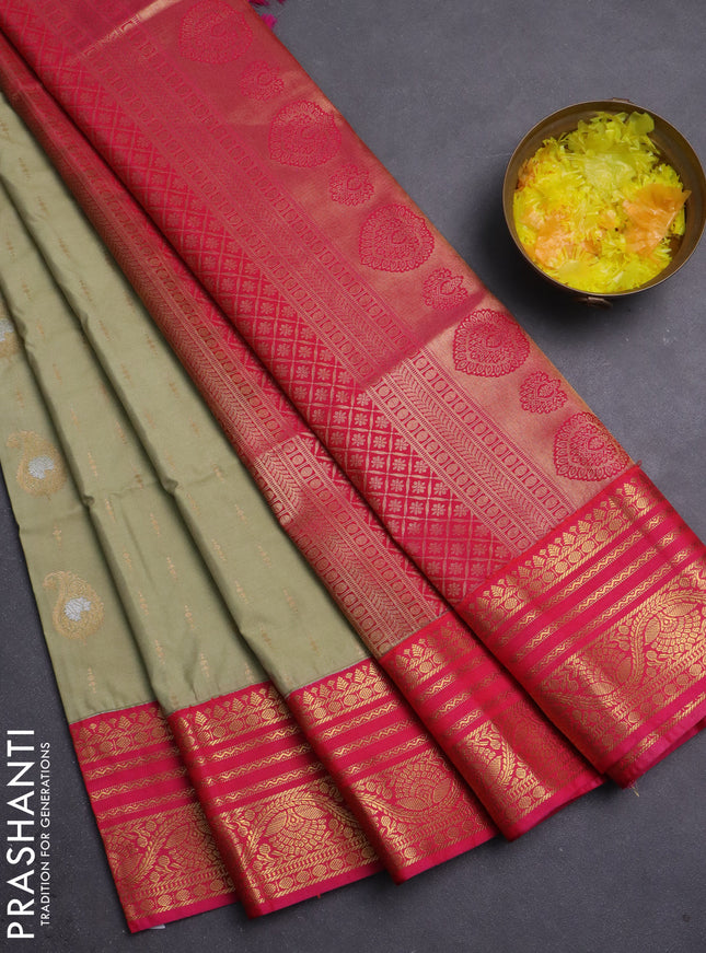 Semi soft silk saree pastel green and pink with allover zari woven buttas and zari woven border