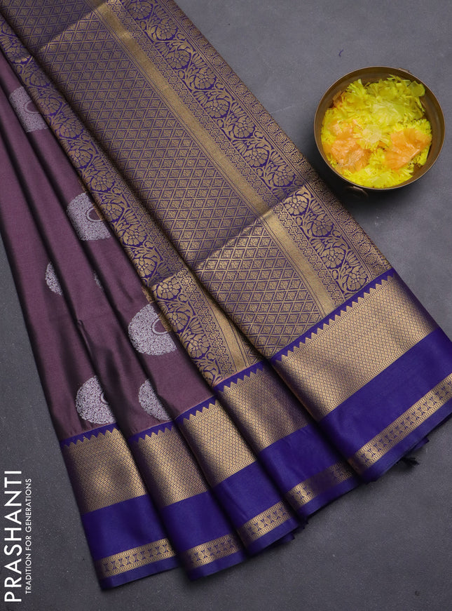 Semi soft silk saree pastel purple and navy blue with zari woven buttas and rettapet zari woven border