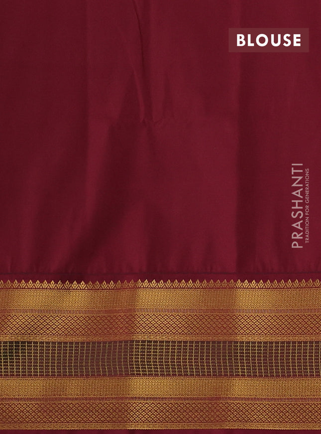 Semi soft silk saree light green and deep maroon with allover zari checks & buttas and zari woven border