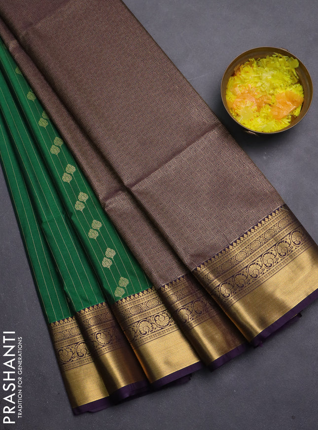 Semi soft silk saree green and violet with allover zari weaves & buttas and zari woven border