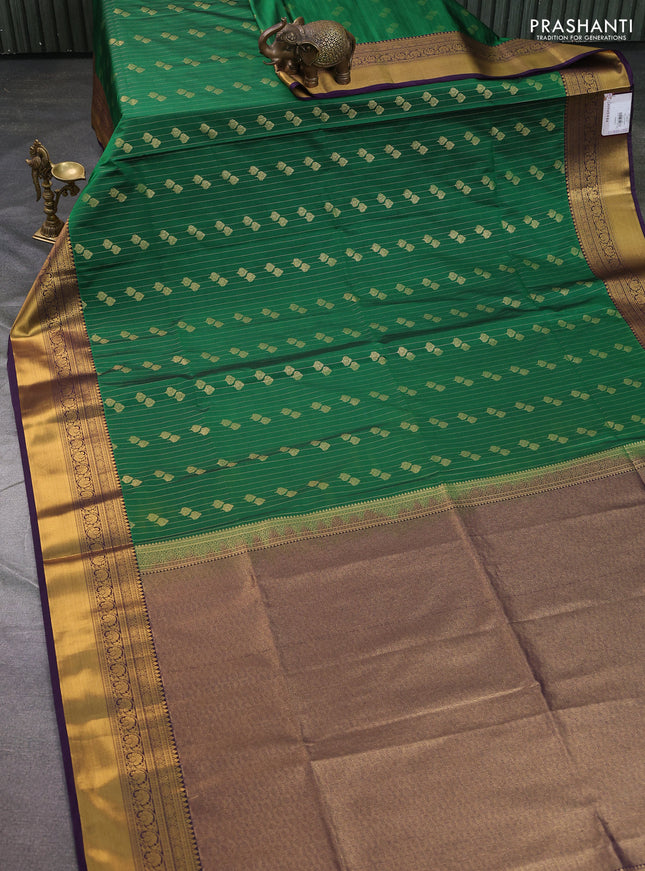 Semi soft silk saree green and violet with allover zari weaves & buttas and zari woven border