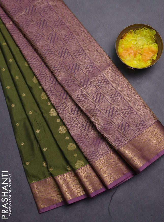 Semi soft silk saree sap green and mauve pink with allover zari woven buttas and zari woven border