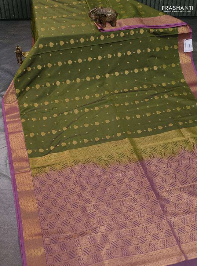 Semi soft silk saree sap green and mauve pink with allover zari woven buttas and zari woven border