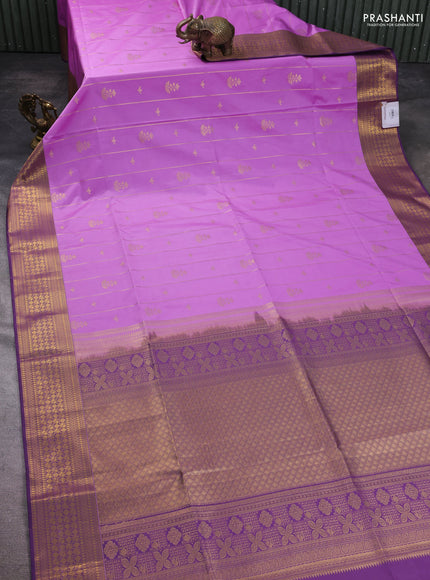 Semi soft silk saree lavender and purple with allover zari weaves & buttas and zari woven border