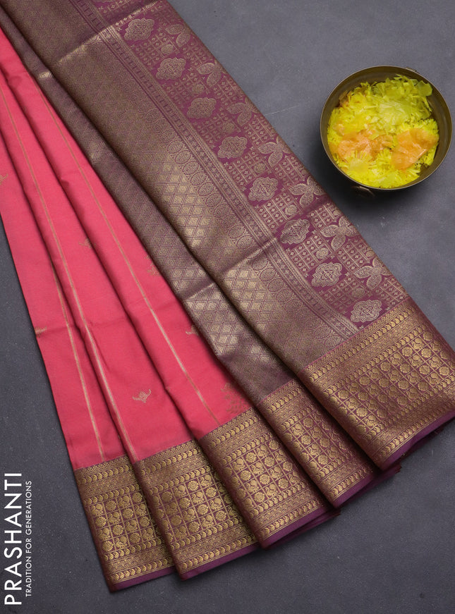Semi soft silk saree peach pink and violet with allover zari weaves & buttas and zari woven border