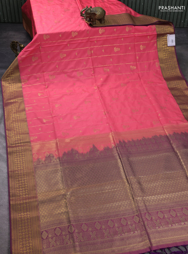 Semi soft silk saree peach pink and violet with allover zari weaves & buttas and zari woven border