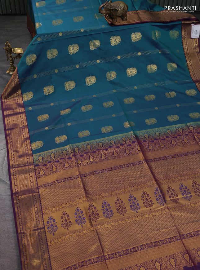 Semi soft silk saree dual shade of blue shade and maroon with zari woven buttas and zari woven korvai border