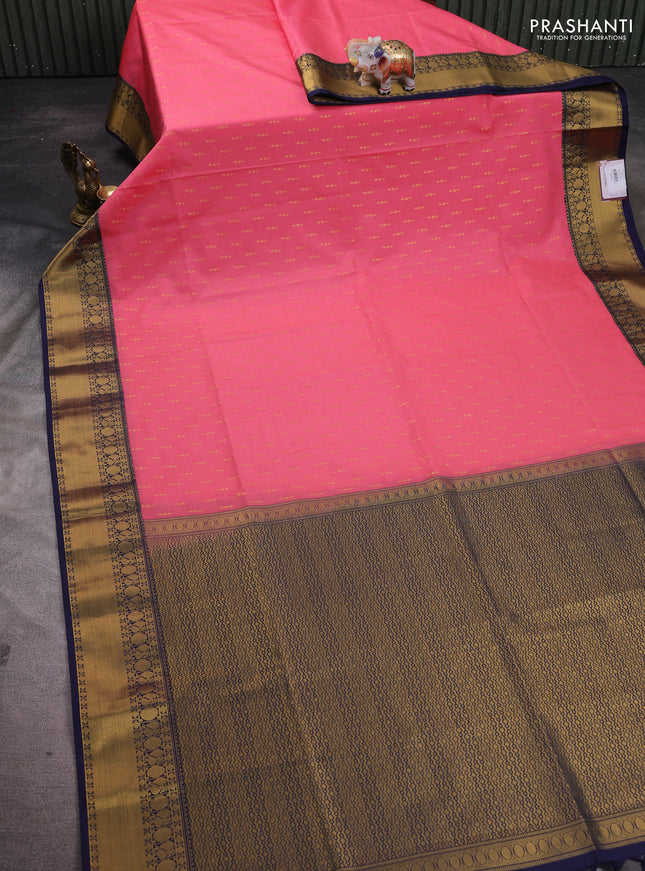Semi soft silk saree peach pink and navy blue with allover zari woven buttas and zari woven border