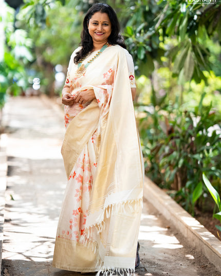 Pure kanchipuram silk saree off white with allover floral design brocade weaves and zari woven border