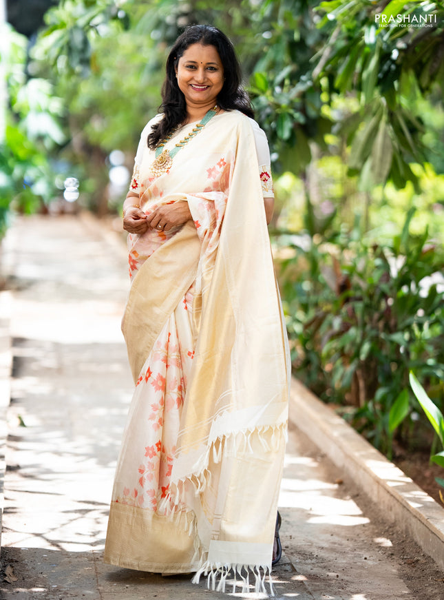 Pure kanchipuram silk saree off white with allover floral design brocade weaves and zari woven border