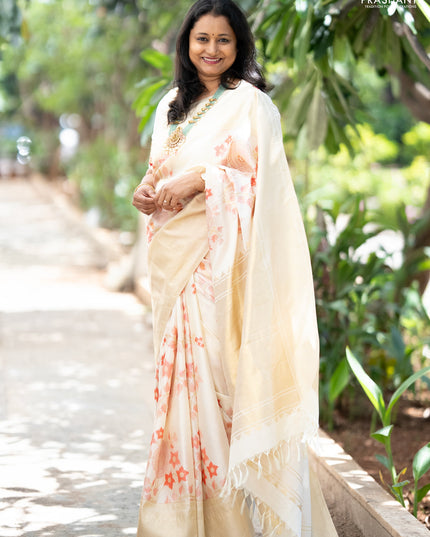 Pure kanchipuram silk saree off white with allover floral design brocade weaves and zari woven border