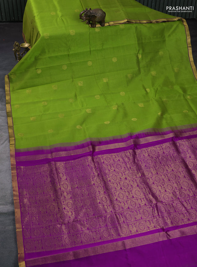 Silk cotton saree light green and purple with annam zari woven buttas and small zari woven border