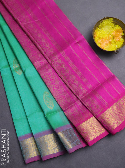 Silk cotton saree dual shade of green shade and pink with paisley zari woven buttas and zari woven border