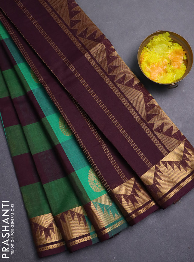 Silk cotton saree green and deep wine shade with allover zari lakshadeepam patten and rettapet zari woven border