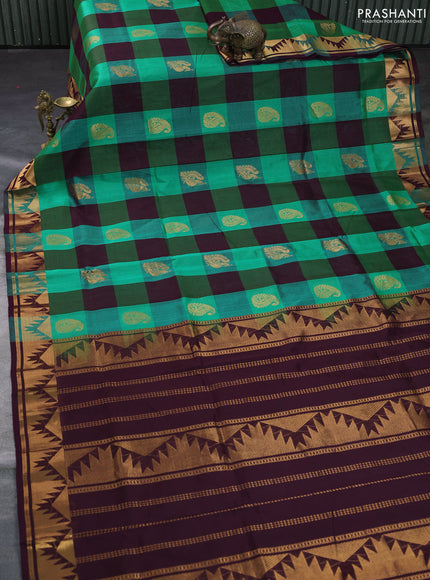 Silk cotton saree green and deep wine shade with allover zari lakshadeepam patten and rettapet zari woven border