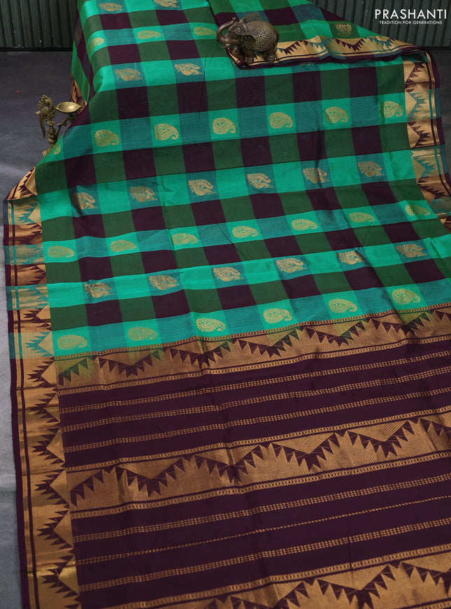 Silk cotton saree green and deep wine shade with allover zari lakshadeepam patten and rettapet zari woven border