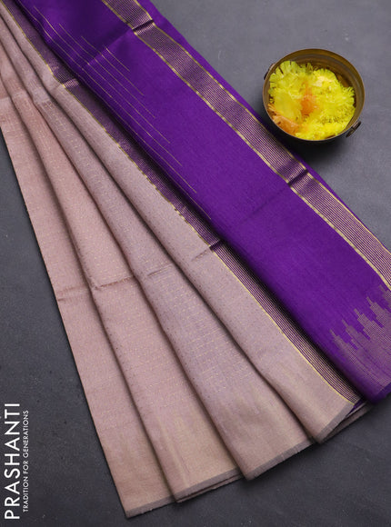 Semi dupion saree pastel peach and purple with allover zari weaves and temple zari woven border