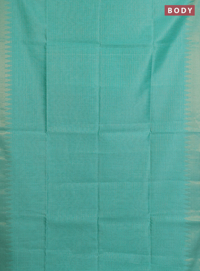 Semi dupion saree teal green and purple with allover zari weaves and temple zari woven border