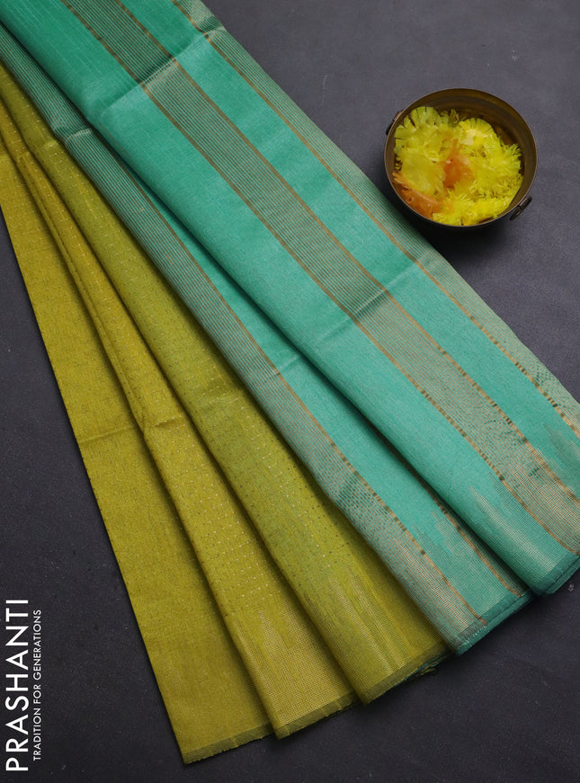 Semi dupion saree lime yellow and teal green with allover zari weaves and temple zari woven border