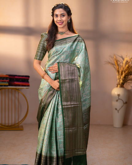 Banarasi warm silk saree pastel green and green with allover thread & zari checked pattern and long zari woven border