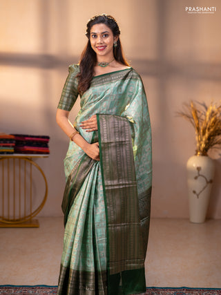 Banarasi warm silk saree pastel green and green with allover thread & zari checked pattern and long zari woven border