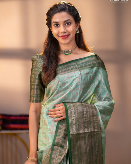 Banarasi warm silk saree pastel green and green with allover thread & zari checked pattern and long zari woven border