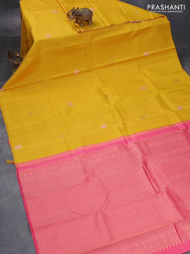 Pure kanjivaram silk saree yellow and pink with allover zari weaves & buttas in borderless style