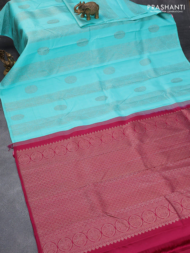 Pure kanjivaram silk saree light blue and dark magenta pink with zari woven buttas in borderless style