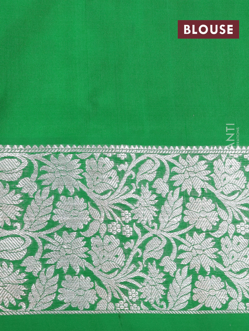 Venkatagiri silk saree dual shade of bluish green and green with allover silver zari woven butta weaves and silver zari woven floral border