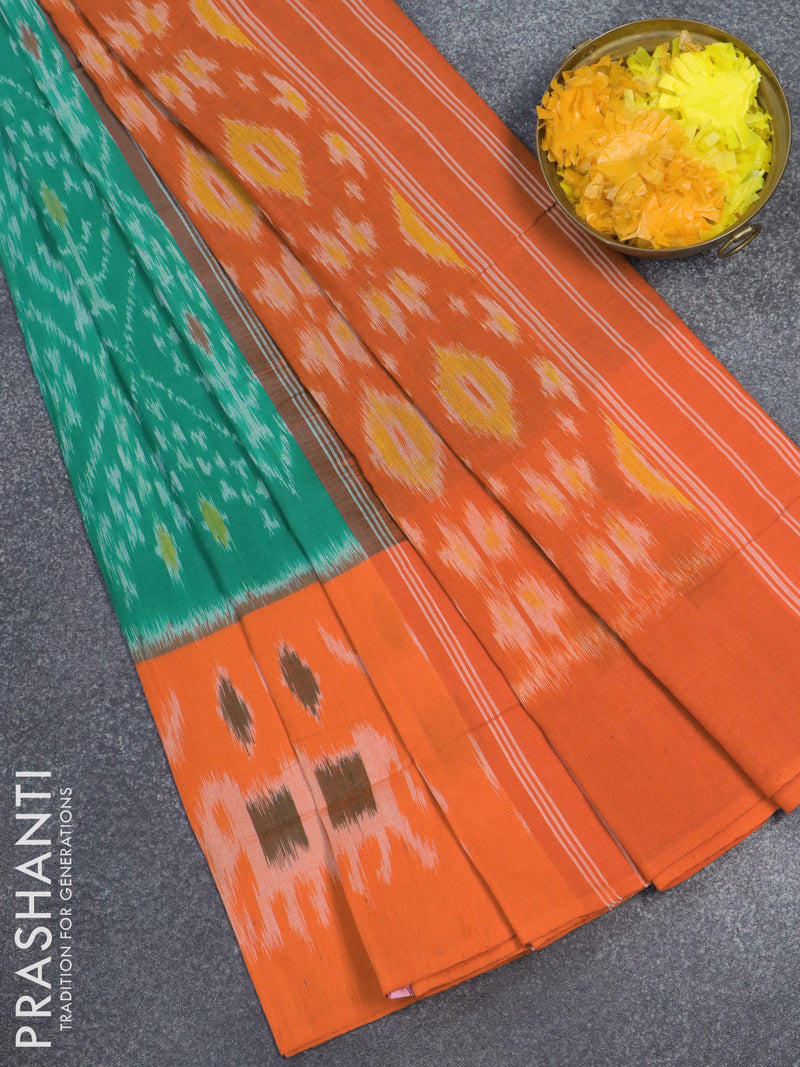 Ikat cotton saree teal green and orange with allover ikat wevaes and printed border
