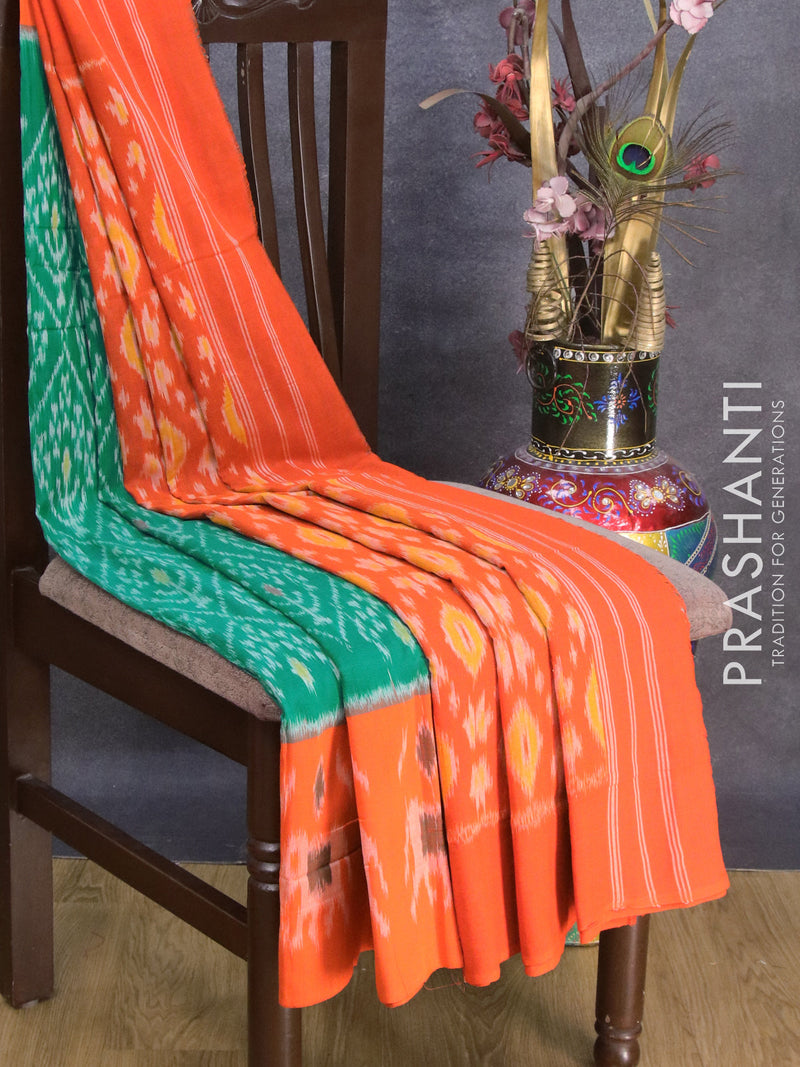 Ikat cotton saree teal green and orange with allover ikat wevaes and printed border