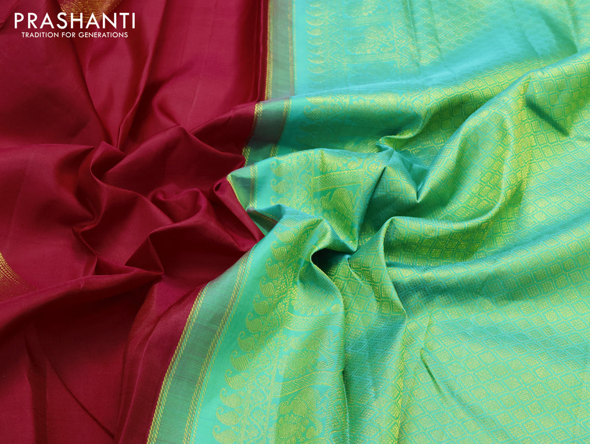 Pure kanjivaram silk saree dark pink and teal green with zari woven geometric buttas in borderless style
