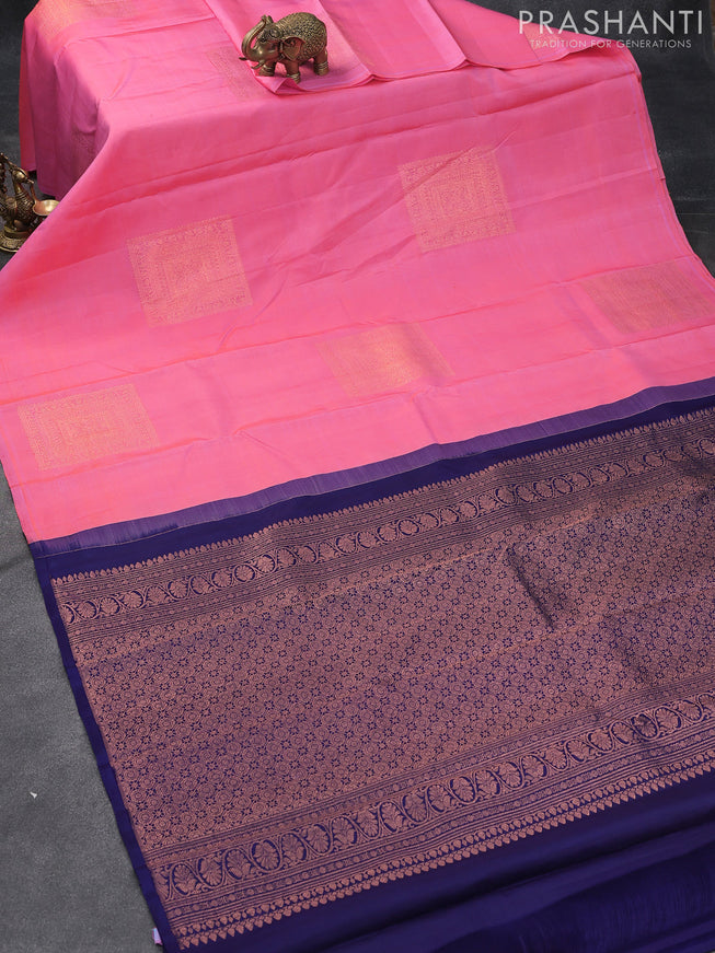 Pure kanjivaram silk saree peach pink and navy blue with zari woven geometric buttas in borderless style